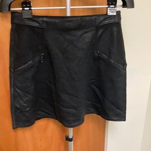 Tinsel brand black skirt. brand new never worn decorative zippers on front